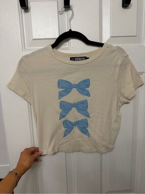 Womens Cream Tee with Blue Bow Print
